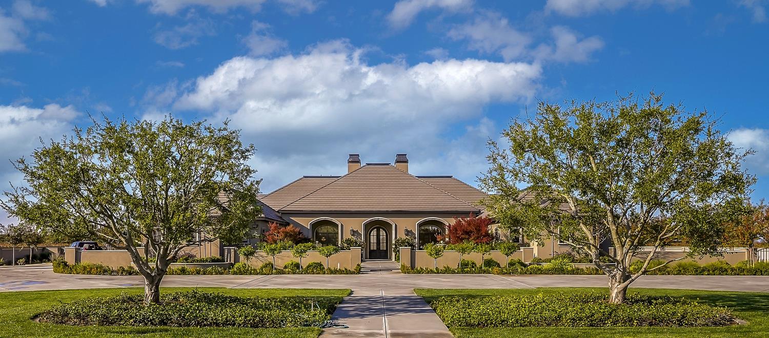 22215 Devries Road Lodi, CA 95242 - Photo 3 of 99 a front view of a house with a yard