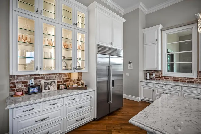 a bedroom with a bed and a dresser in it