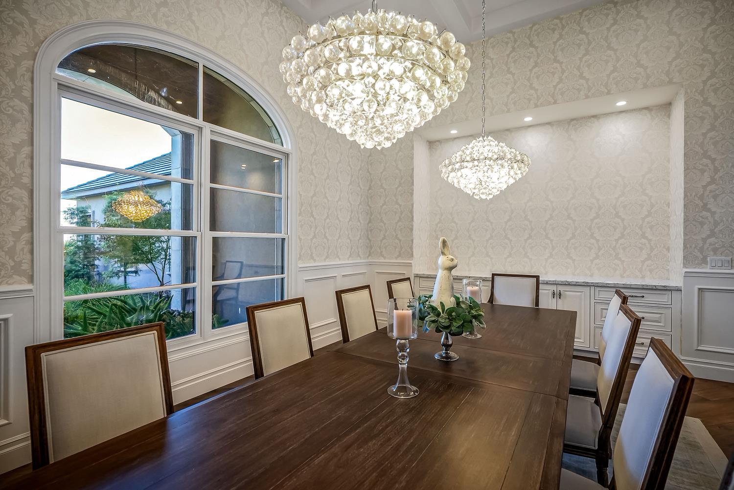 22215 Devries Road Lodi, CA 95242 - Photo 38 of 99 a view of a dining room with furniture a chandelier and wooden floor