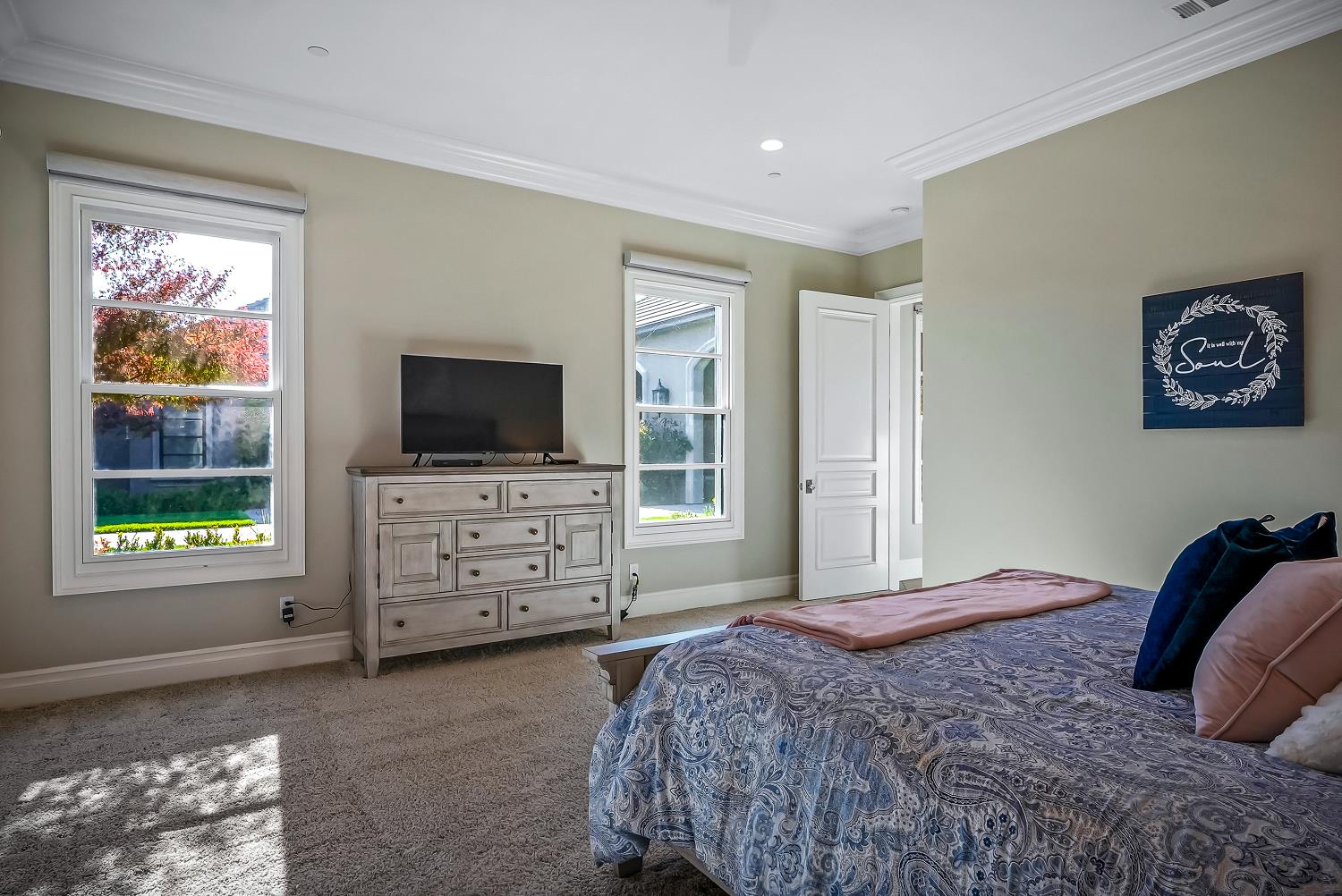 22215 Devries Road Lodi, CA 95242 - Photo 47 of 99 a bedroom with a bed and flat screen tv