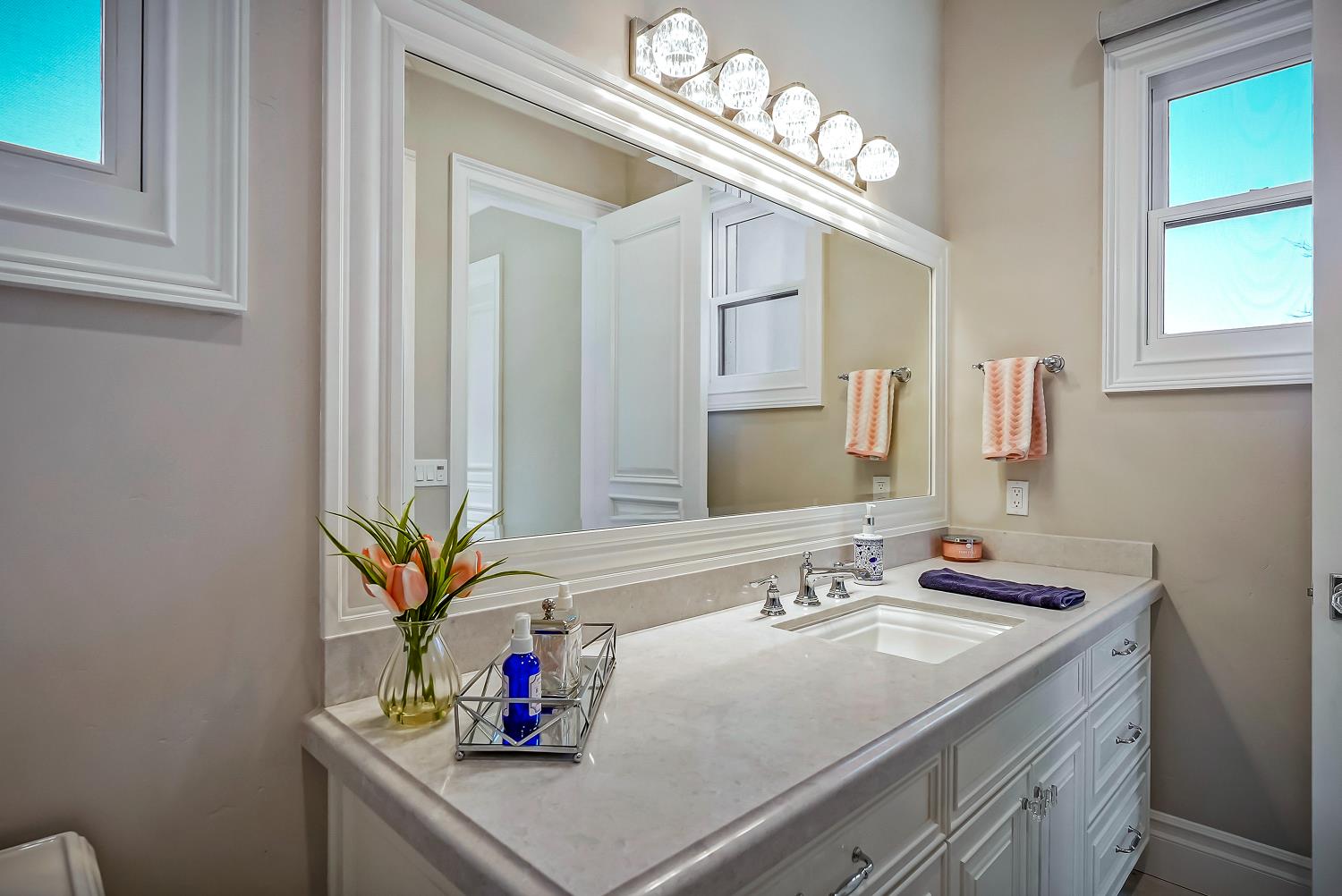 22215 Devries Road Lodi, CA 95242 - Photo 49 of 99 a bathroom with a sink and a mirror