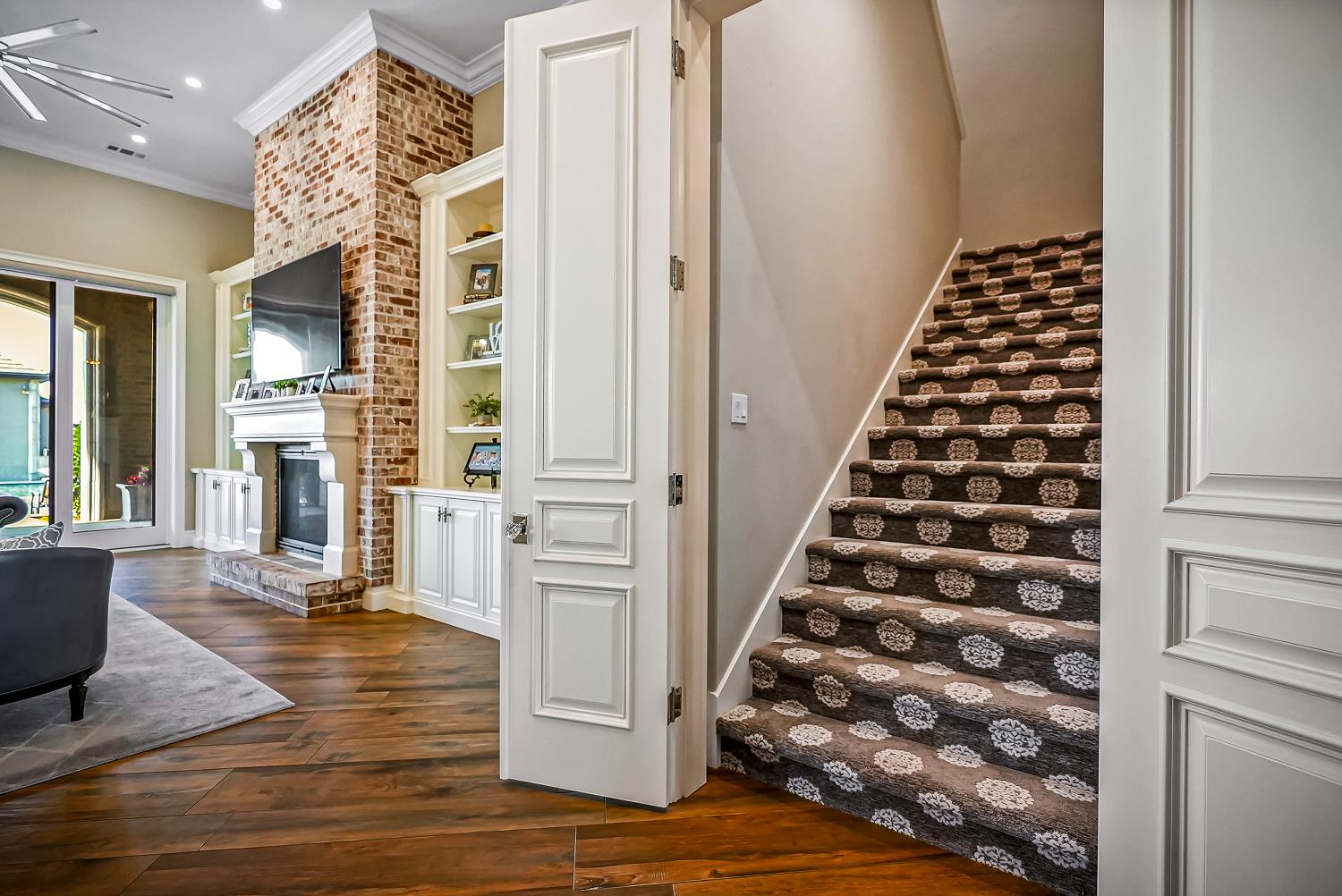 22215 Devries Road Lodi, CA 95242 - Photo 65 of 99 a view of a hallway with wooden floor and staircase