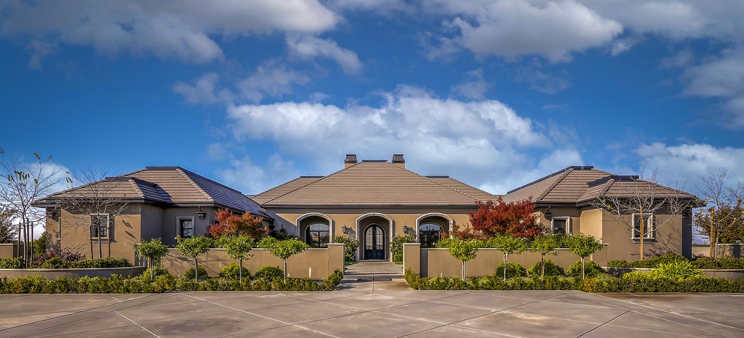 22215 Devries Road Lodi, CA 95242 - Photo 7 of 99 front view of a house with a yard