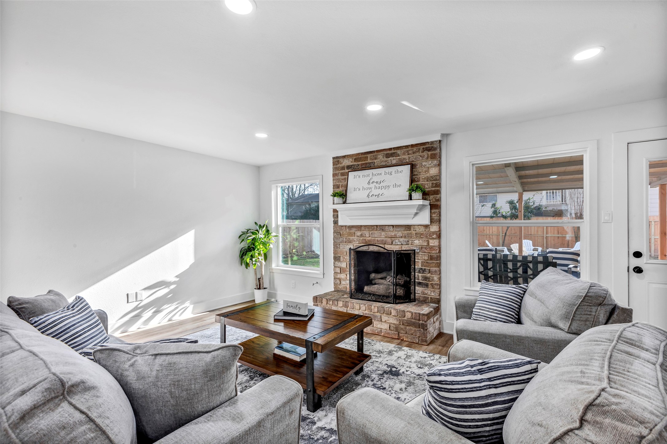 17207 Hill View Lane Spring, TX 77379 - Photo 11 of 34 a living room with furniture and a fireplace