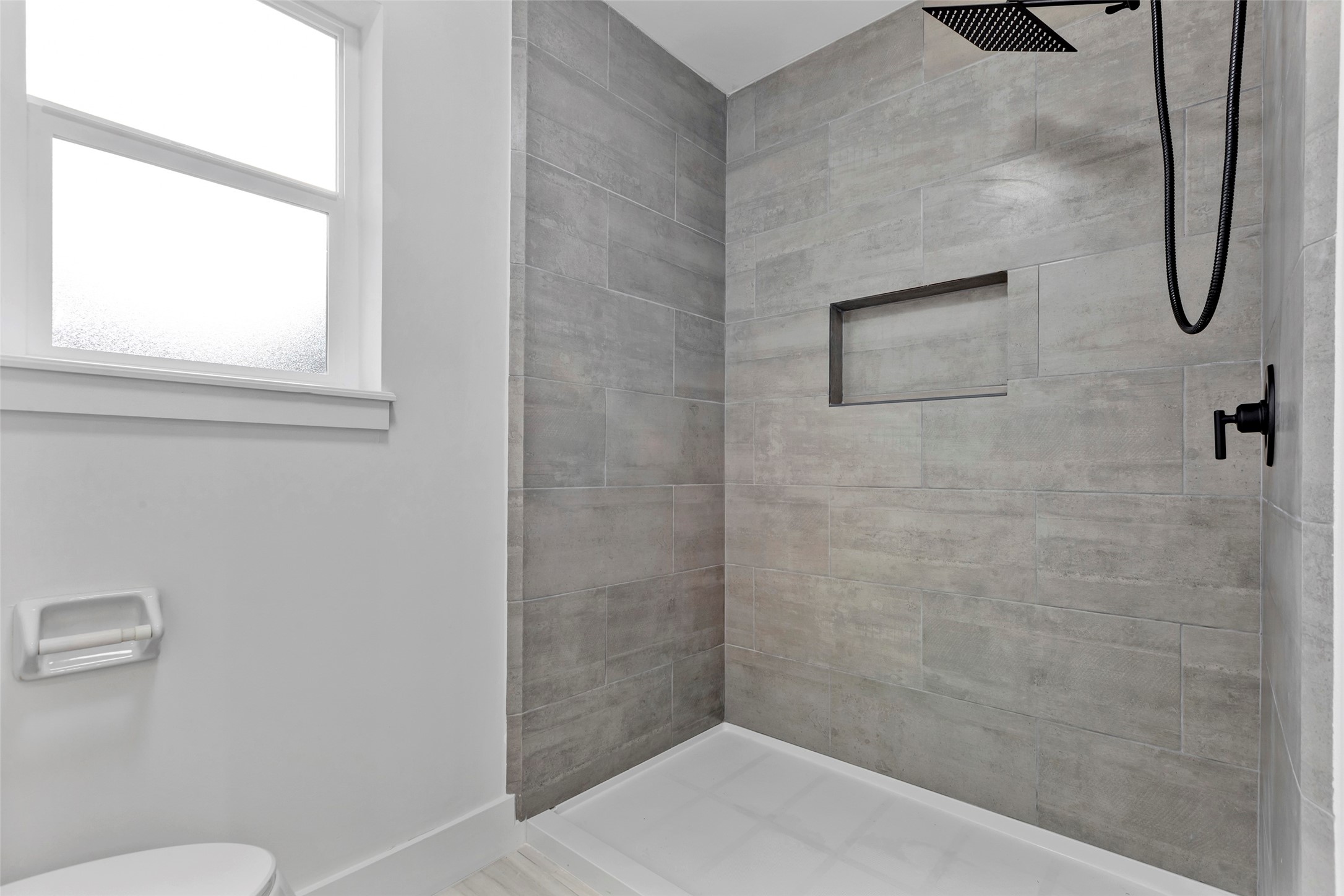 17207 Hill View Lane Spring, TX 77379 - Photo 18 of 34 a bathroom with a shower