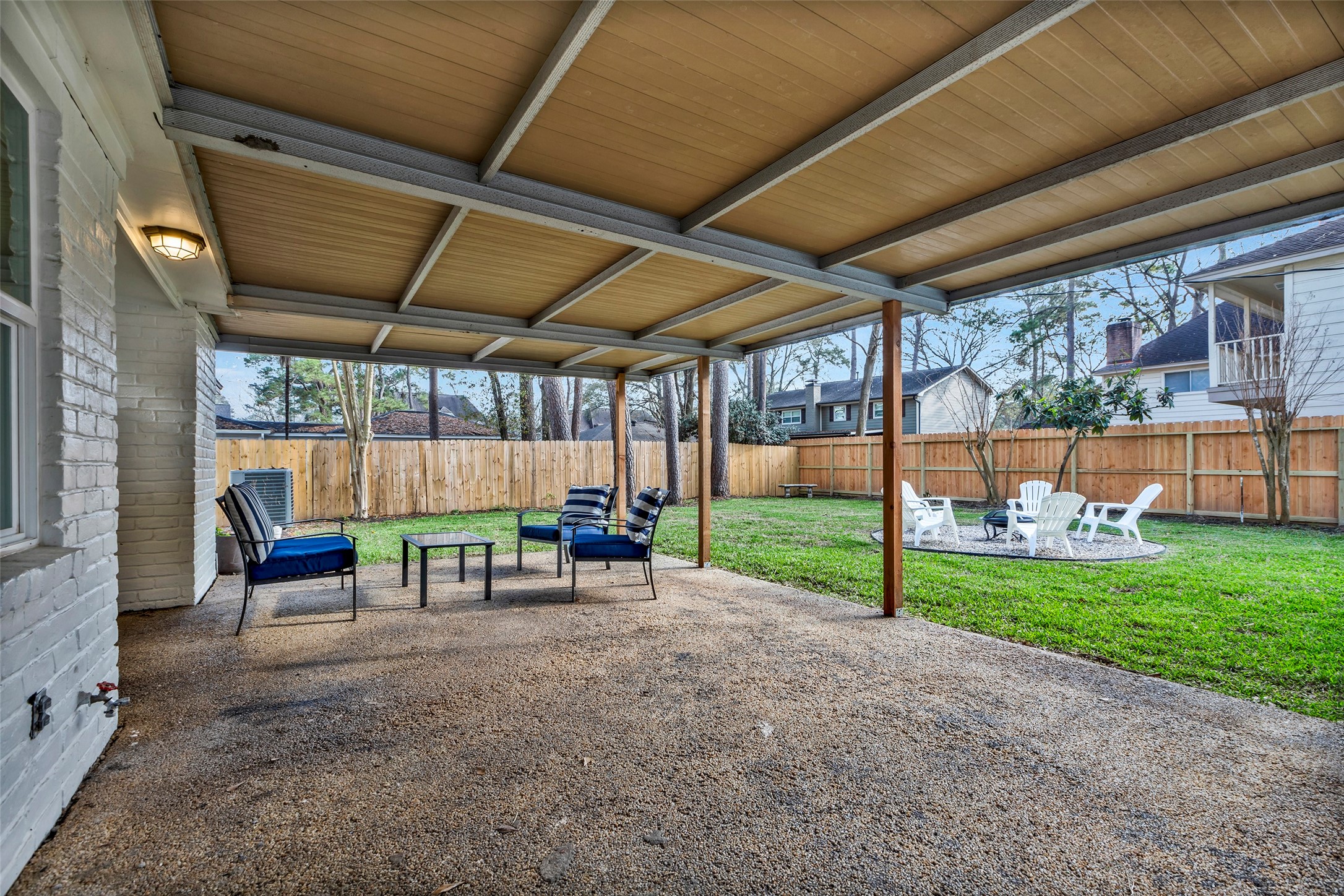 17207 Hill View Lane Spring, TX 77379 - Photo 23 of 34 a view of a room with chairs and backyard