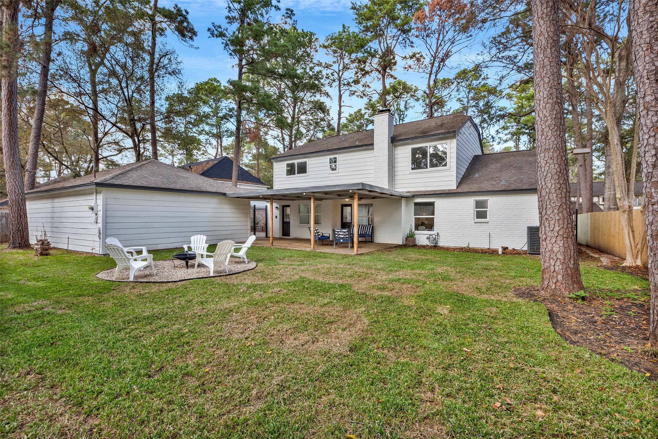 17207 Hill View Lane Spring, TX 77379 - Photo 26 of 34 a view of a house with a yard and sitting area