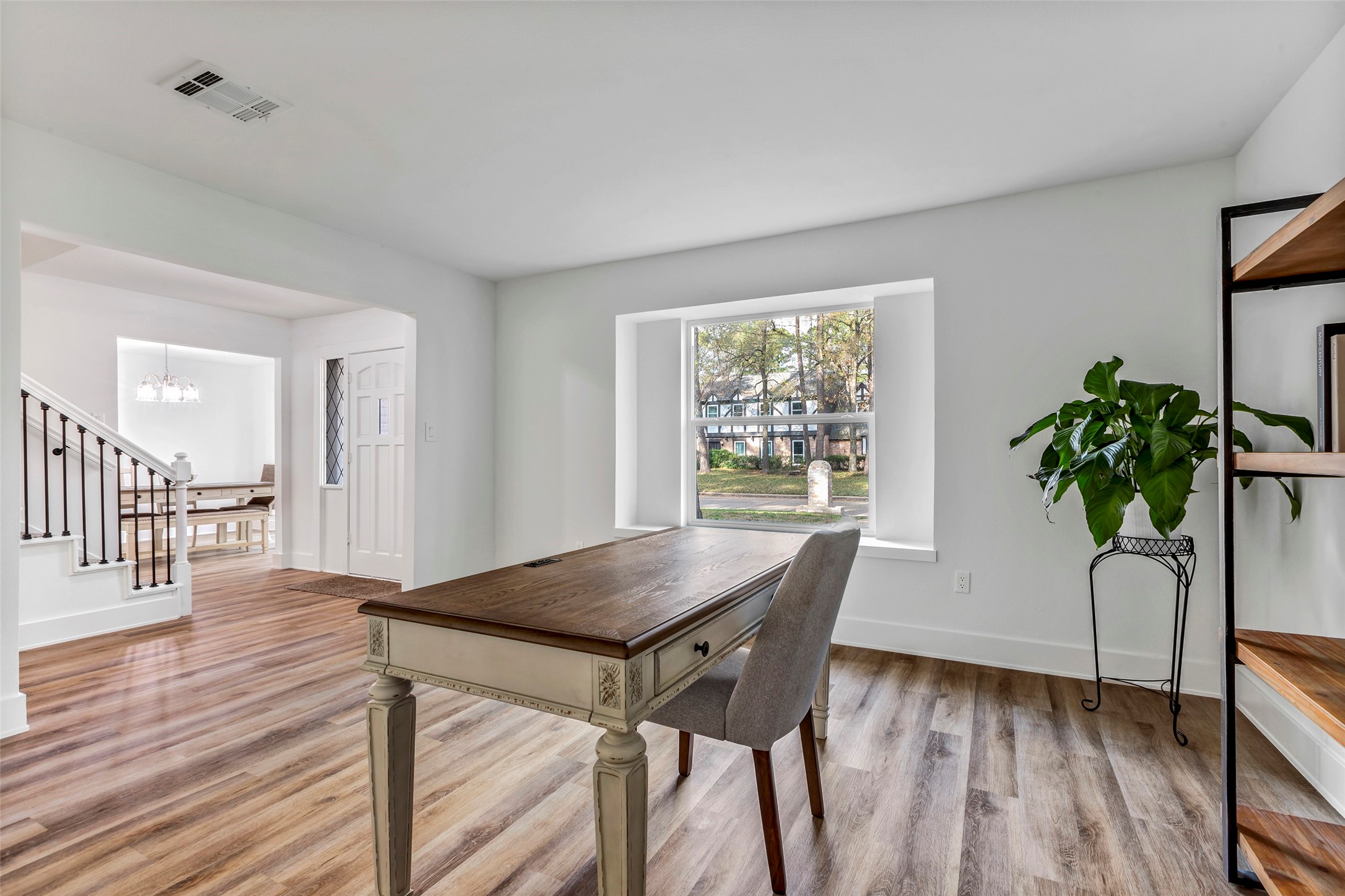 17207 Hill View Lane Spring, TX 77379 - Photo 3 of 34 a view of a dining room with furniture and a potted plant