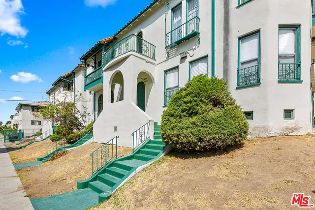 a front view of a multi story residential apartment building