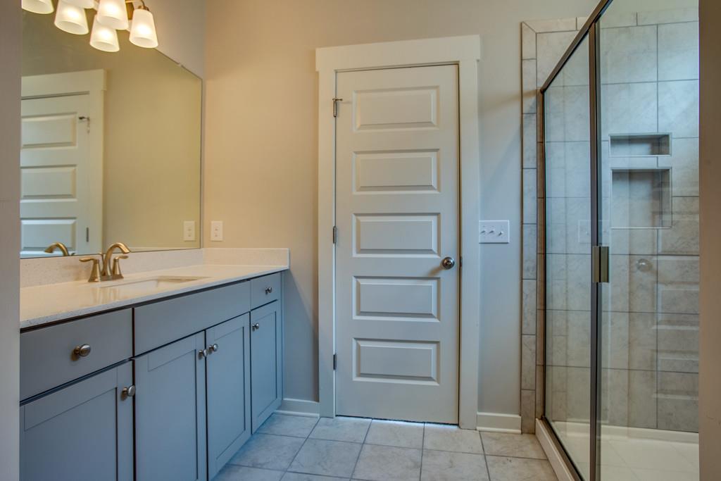 205 Sable Lane Spring Hill, TN 37174 - Photo 14 of 26 master bath with double vanity with quartz countertops. photos are of same plan and finishes will vary