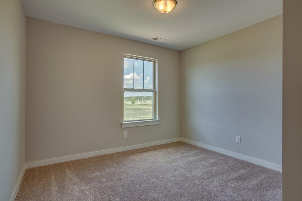 205 Sable Lane Spring Hill, TN 37174 - Photo 22 of 26 bedroom 3. photos are of same plan and finishes will vary.