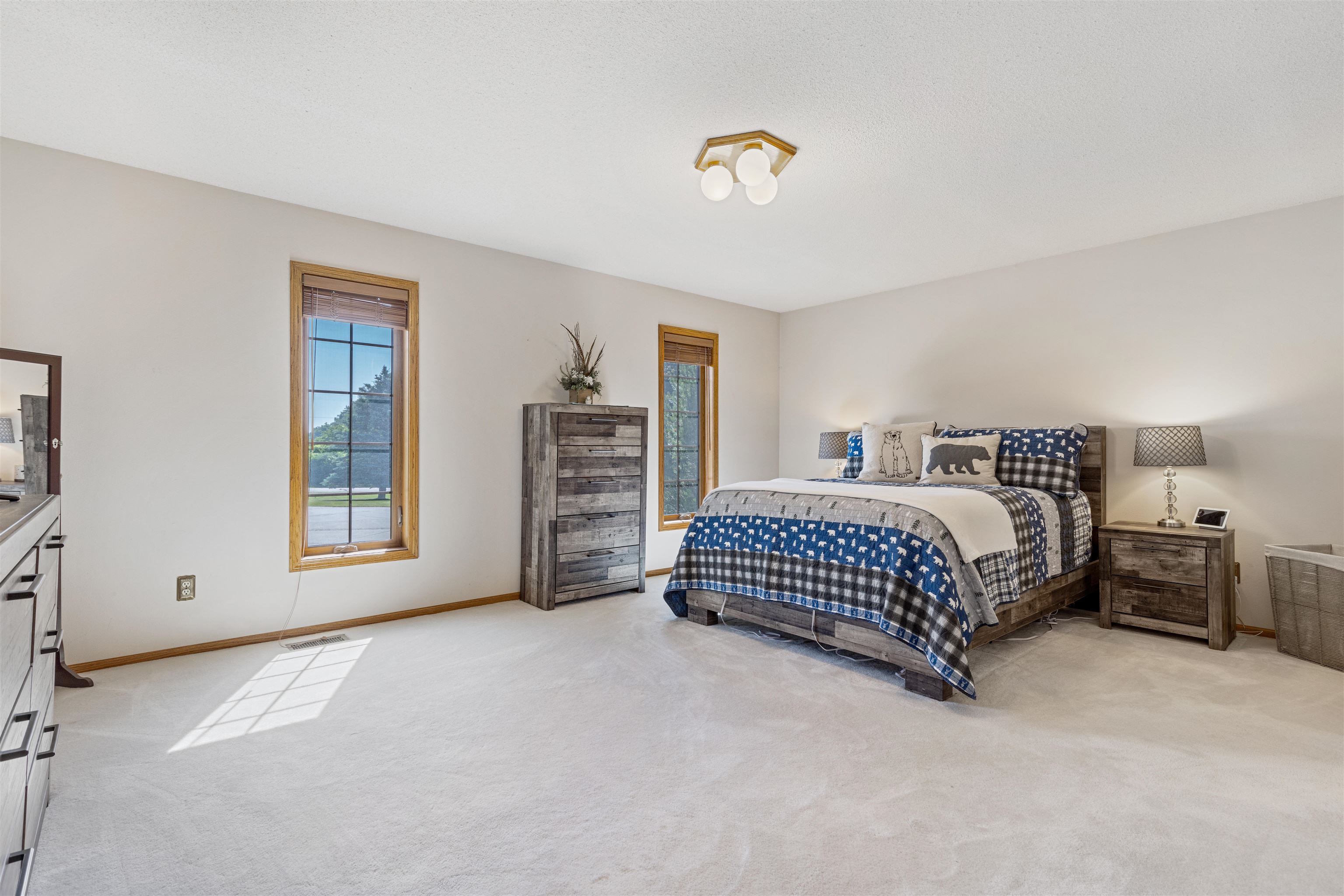 11136 Moate Road Durand, IL 61024 - Photo 17 of 55 a bedroom with a bed and dresser