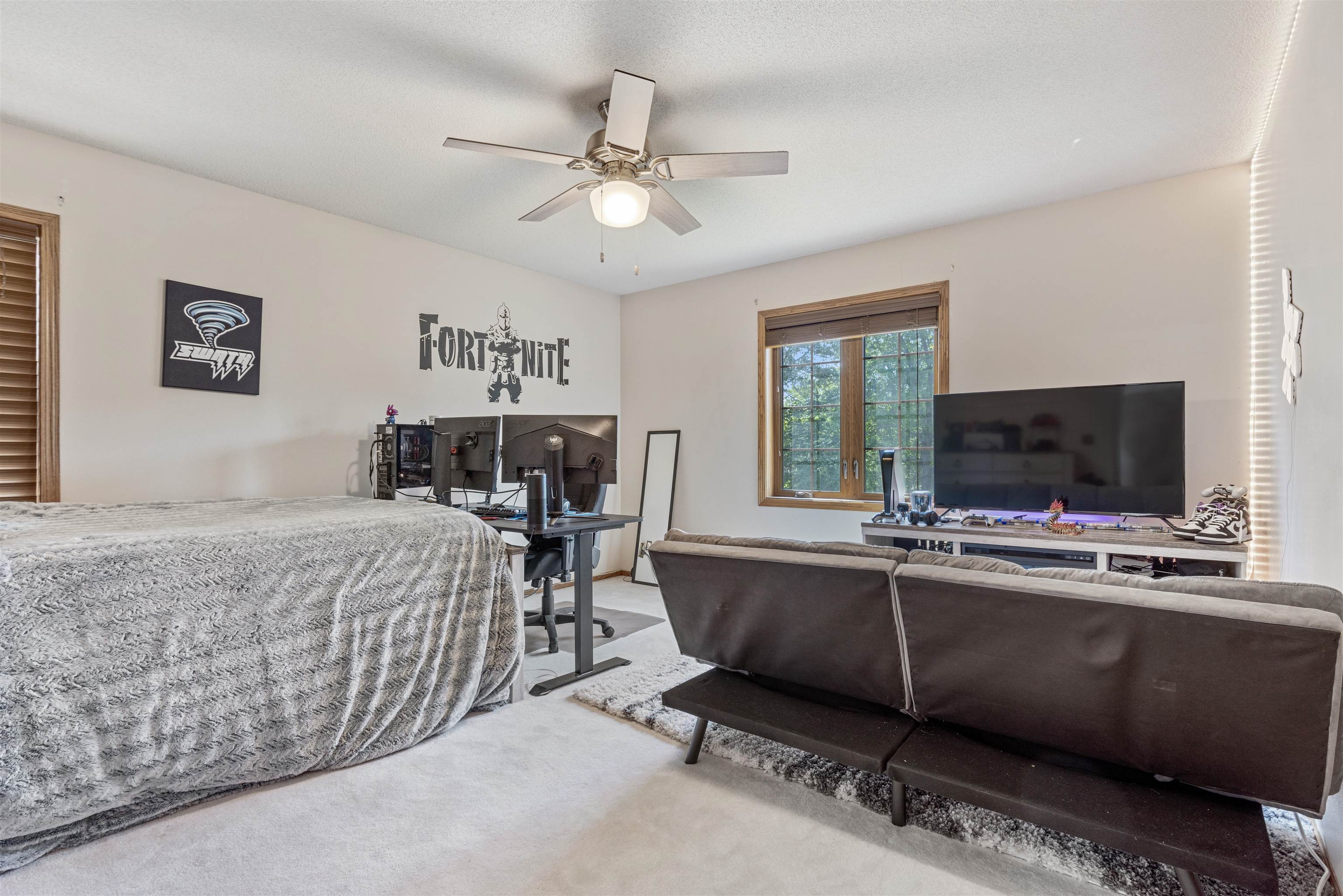 11136 Moate Road Durand, IL 61024 - Photo 25 of 55 a living room with furniture and a flat screen tv