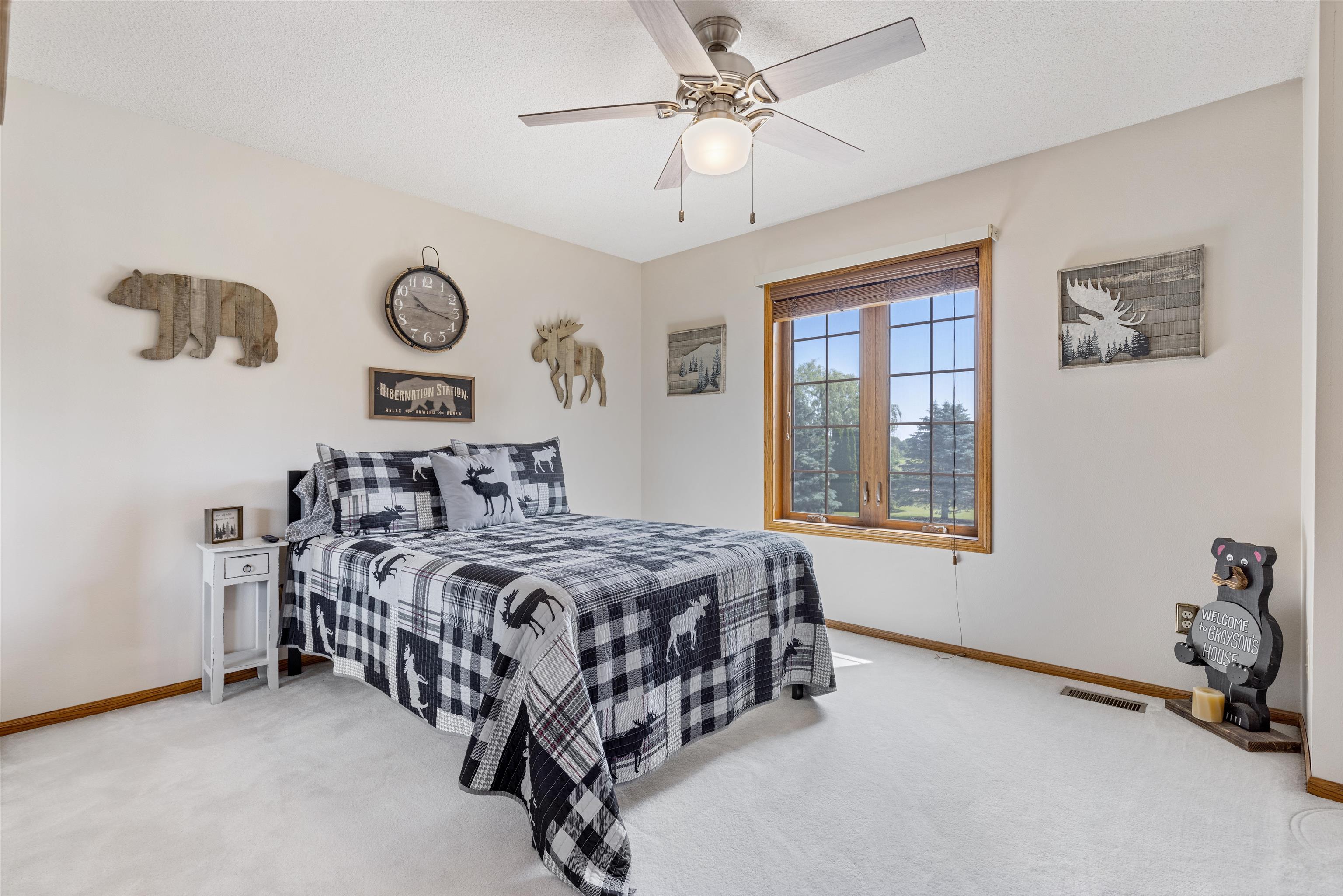11136 Moate Road Durand, IL 61024 - Photo 29 of 55 a bedroom with a bed and a window