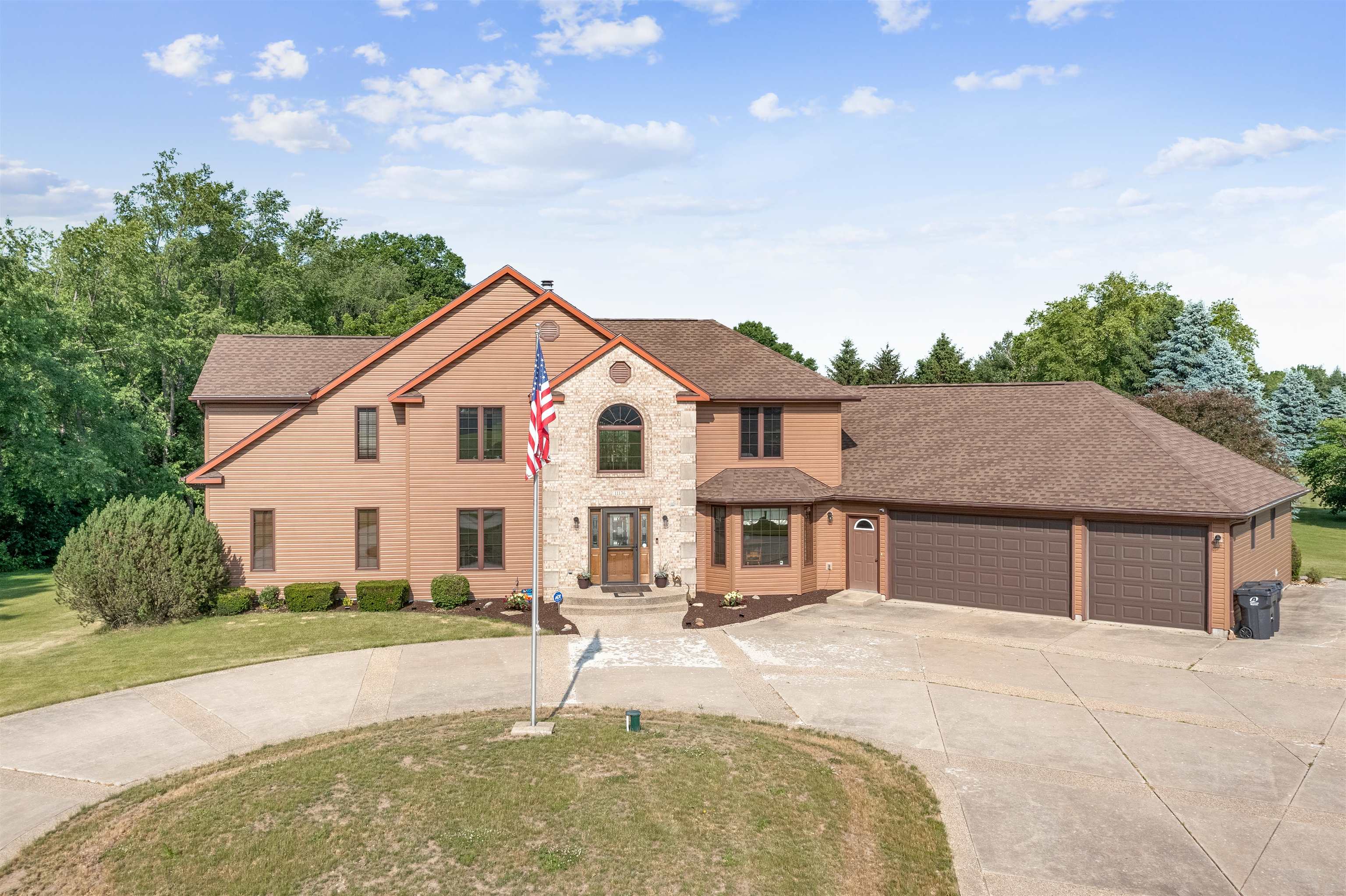 11136 Moate Road Durand, IL 61024 - Photo 3 of 55 a house with swimming pool in front of it