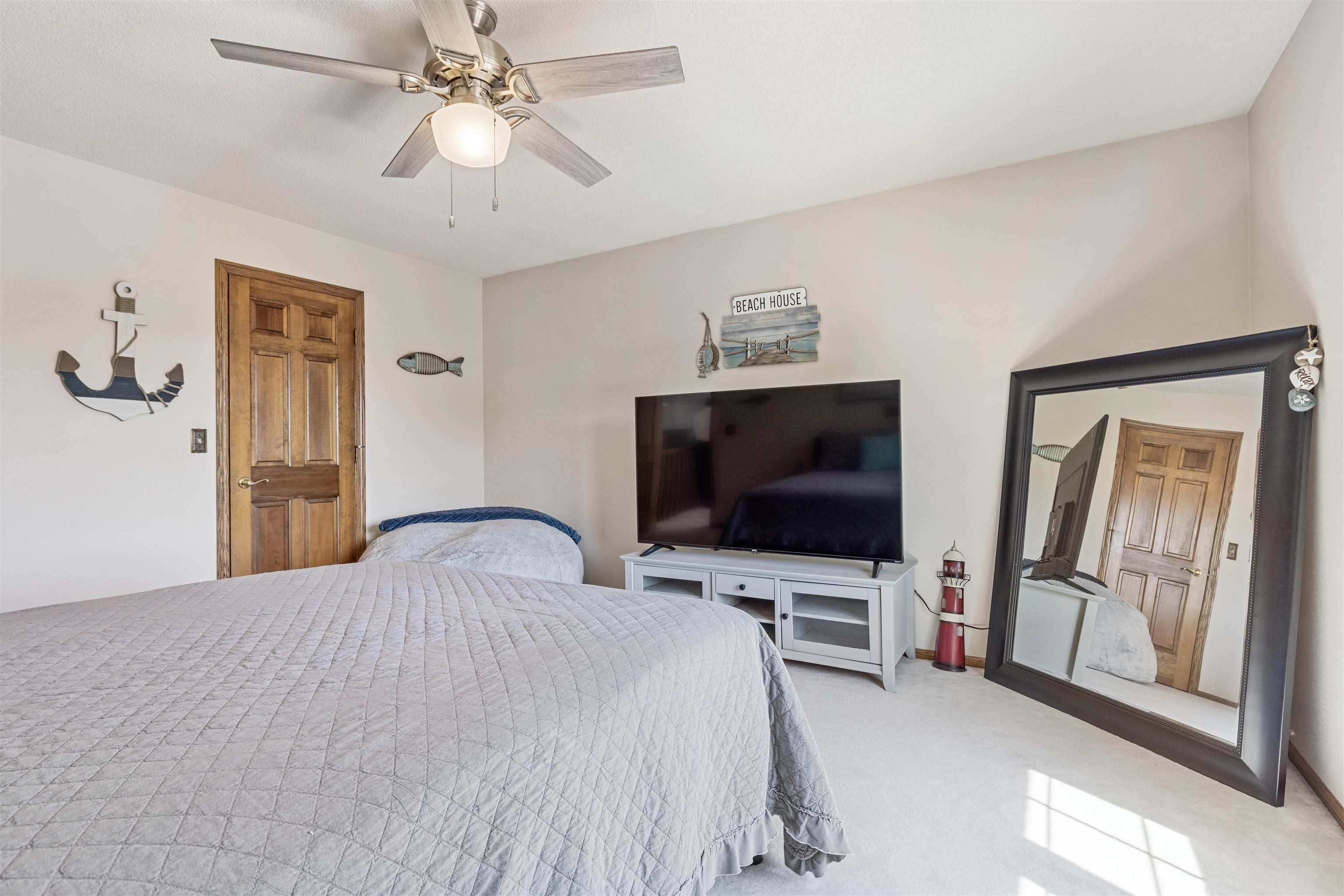 11136 Moate Road Durand, IL 61024 - Photo 32 of 55 a bedroom with a bed tv and a window