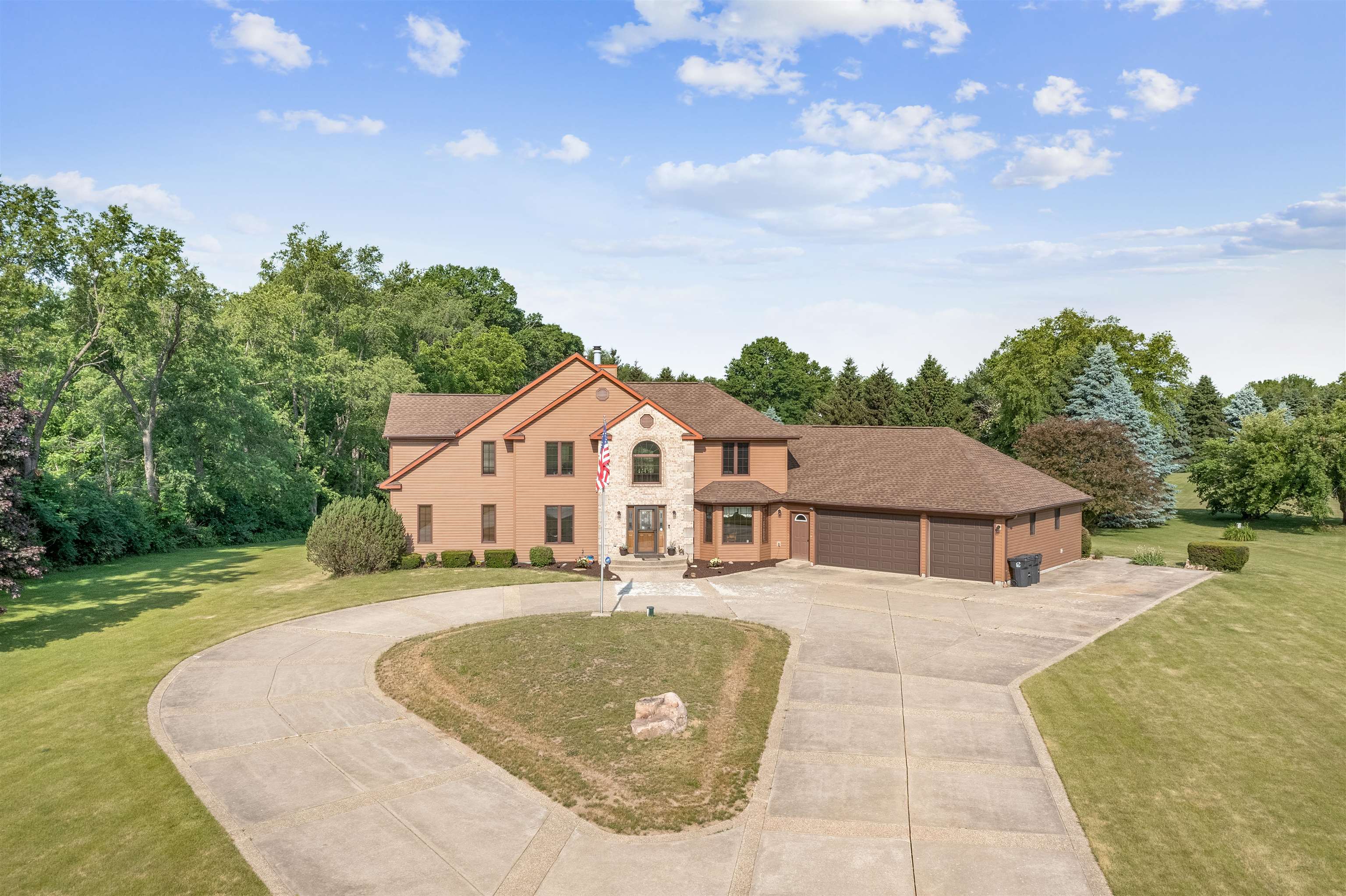 11136 Moate Road Durand, IL 61024 - Photo 4 of 55 a view of a house with a backyard and sitting area