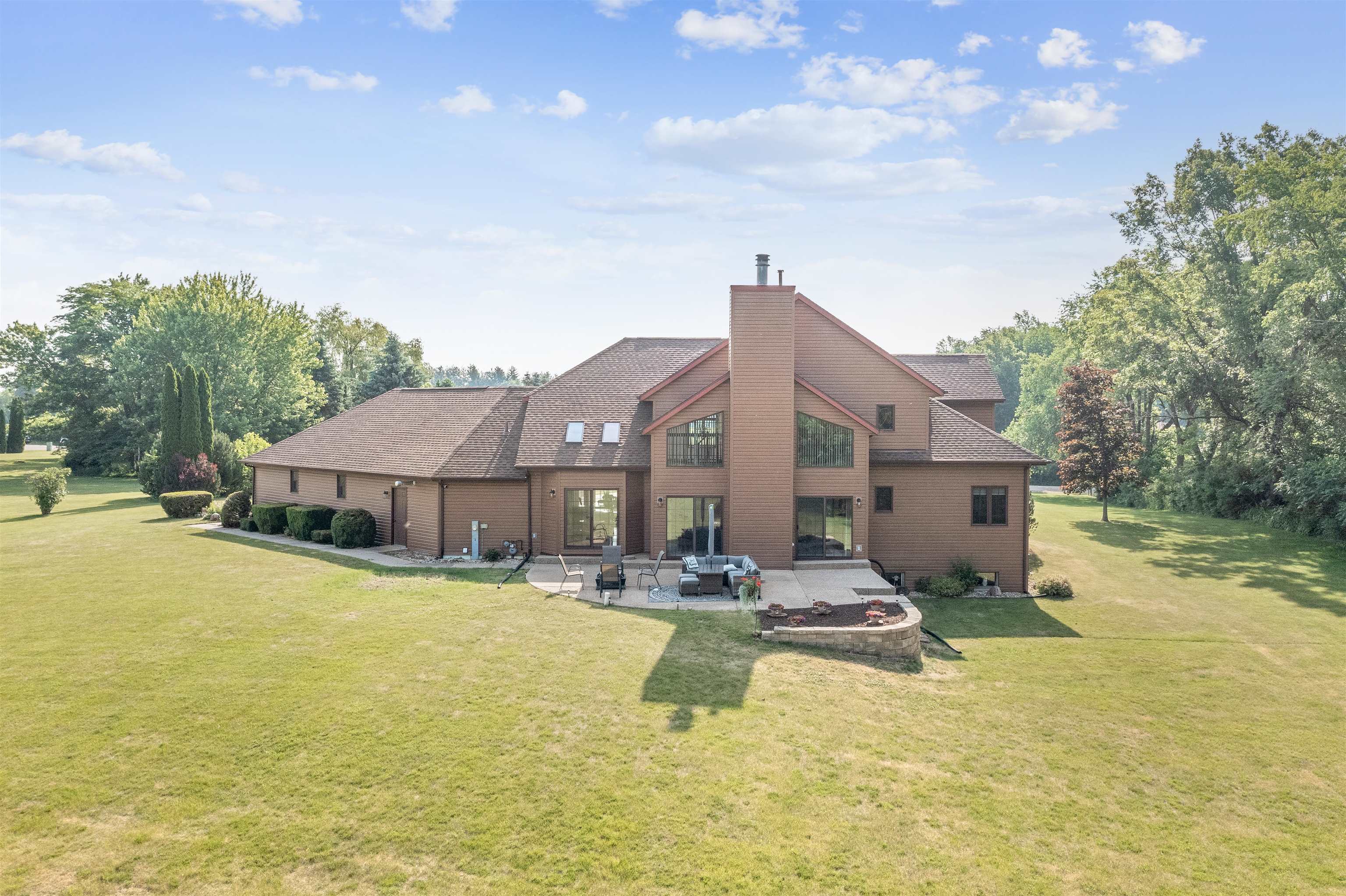 11136 Moate Road Durand, IL 61024 - Photo 45 of 55 a house view with swimming pool and sitting area