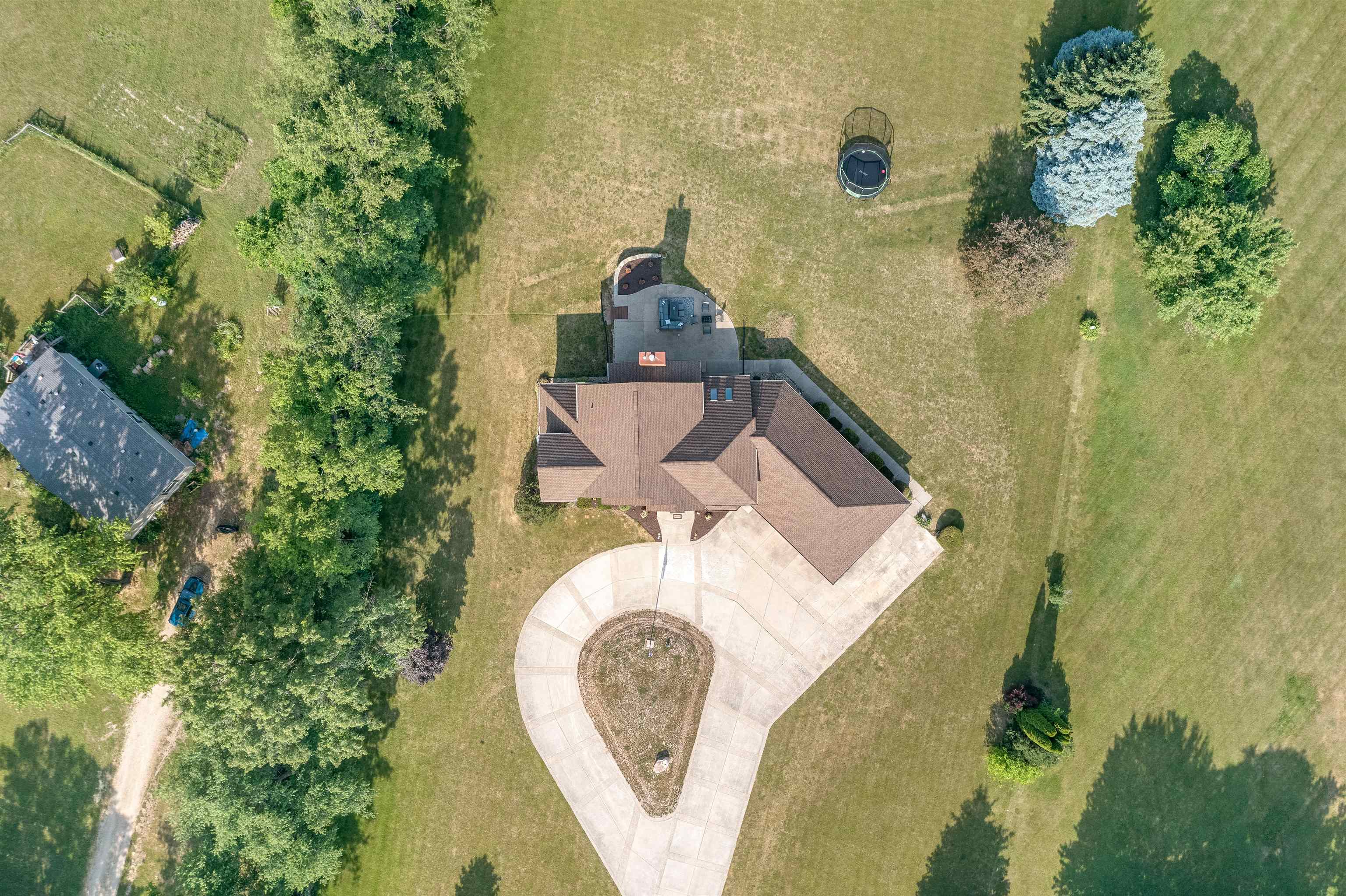11136 Moate Road Durand, IL 61024 - Photo 49 of 55 an aerial view of a house with swimming pool and garden