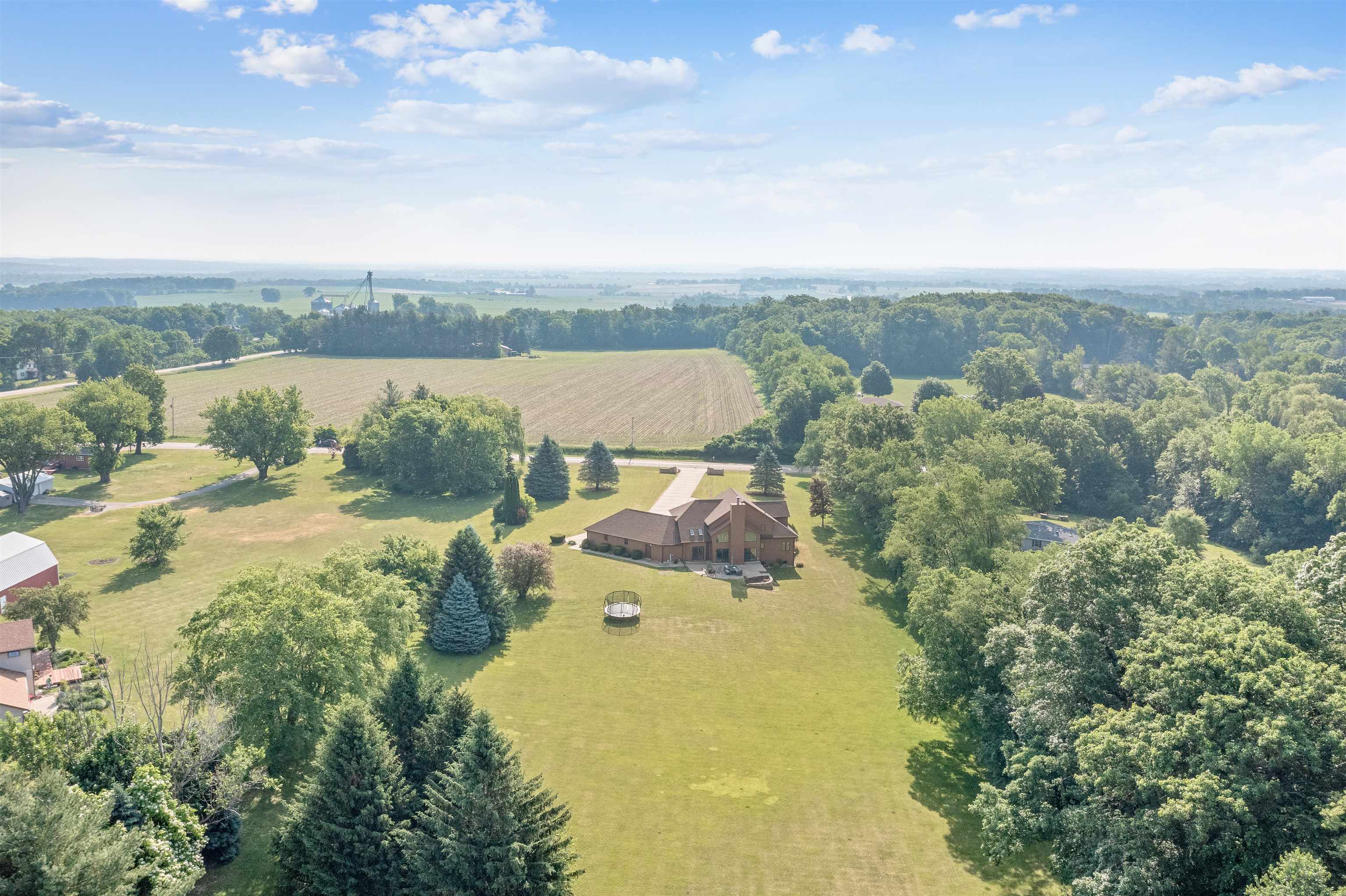 11136 Moate Road Durand, IL 61024 - Photo 54 of 55 an aerial view of a house with lake view