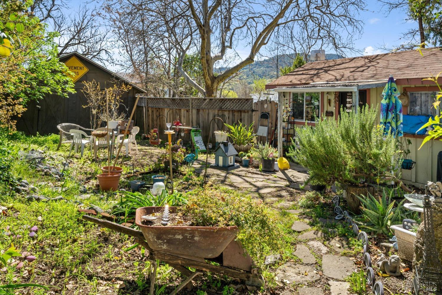 161 Cherry Street Ukiah, CA 95482 - Photo 19 of 39 a view of a patio with table and chairs and potted plants