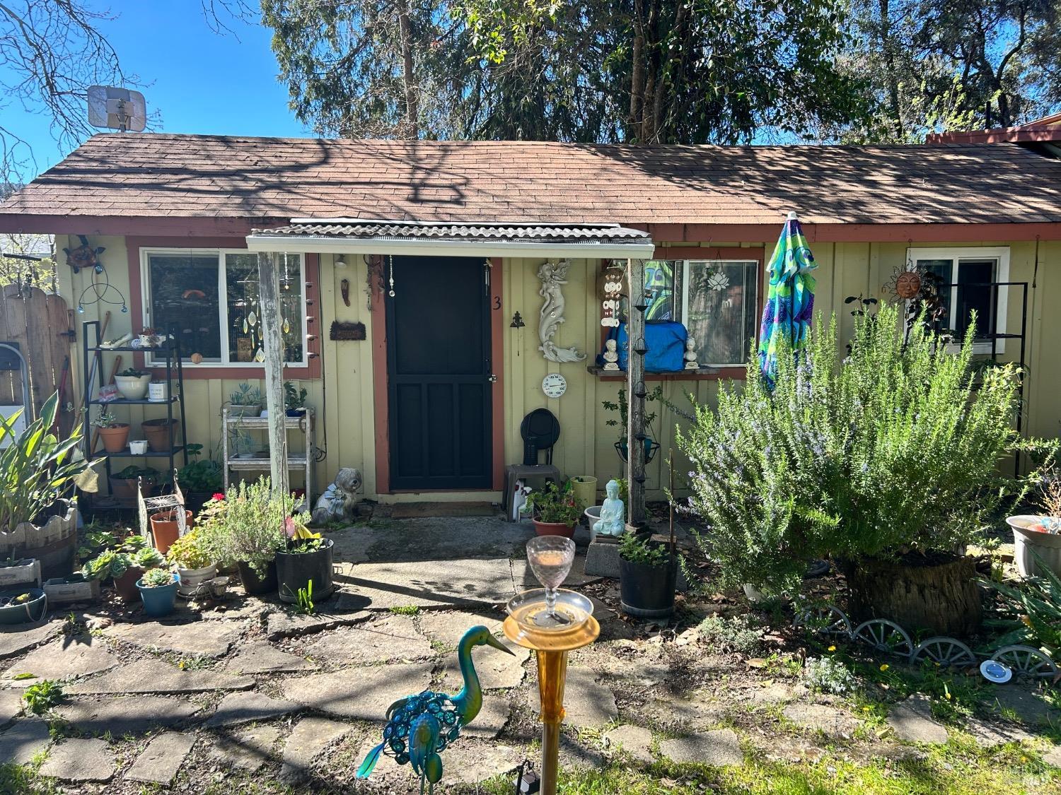 161 Cherry Street Ukiah, CA 95482 - Photo 20 of 39 a front view of a house with garden