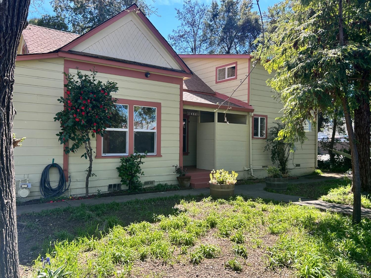 161 Cherry Street Ukiah, CA 95482 - Photo 3 of 39 a front view of a house with garden