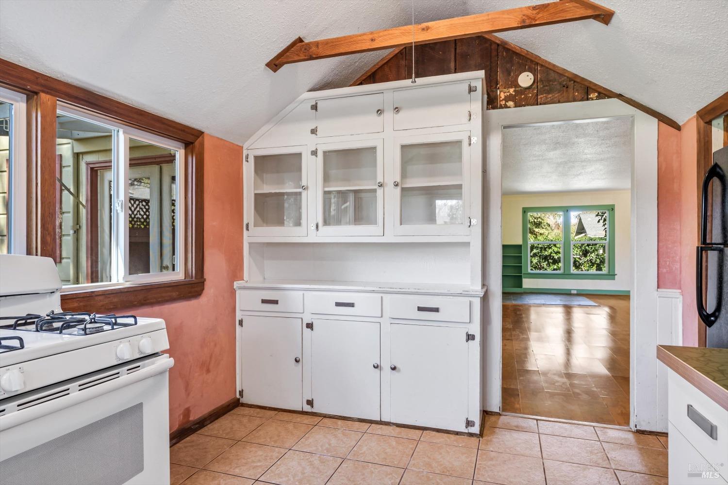 161 Cherry Street Ukiah, CA 95482 - Photo 9 of 39 a kitchen with a cabinets and stove top oven