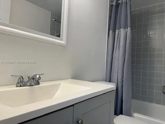 a bathroom with a sink and a bathtub