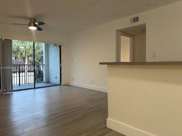 640 South Park Road, Unit 264 Hollywood, FL 33021 - Photo 3 of 14 a view of an empty room with wooden floor and a window