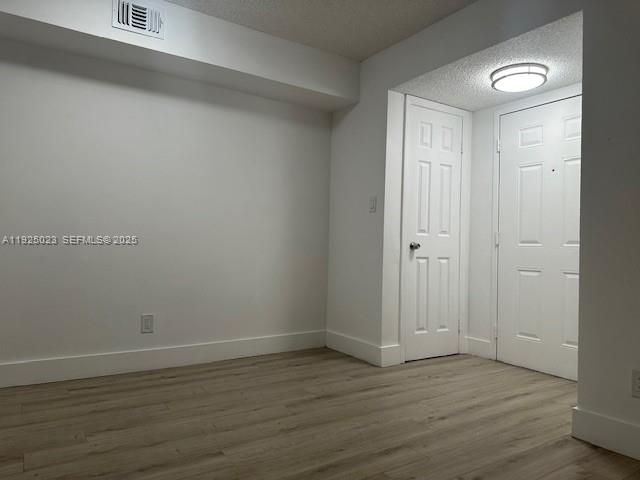 640 South Park Road, Unit 264 Hollywood, FL 33021 - Photo 5 of 14 a view of wooden floor in an empty room