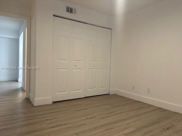640 South Park Road, Unit 264 Hollywood, FL 33021 - Photo 7 of 14 an empty room with wooden floor