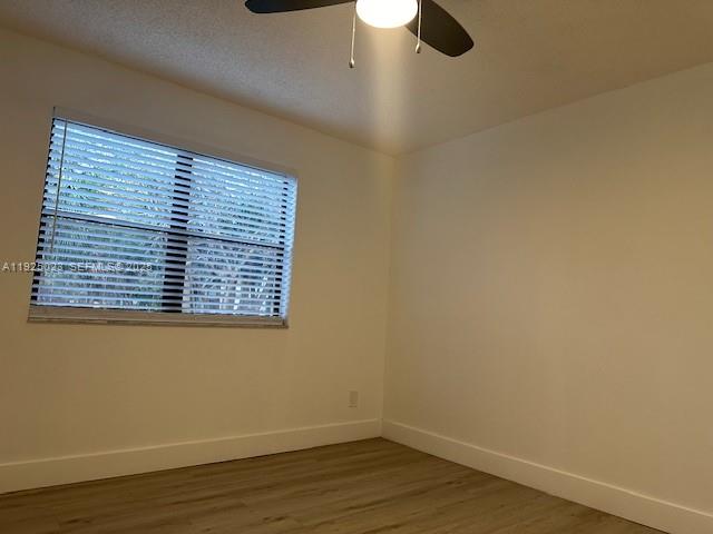 640 South Park Road, Unit 264 Hollywood, FL 33021 - Photo 8 of 14 a view of a small space with wooden floor and a window