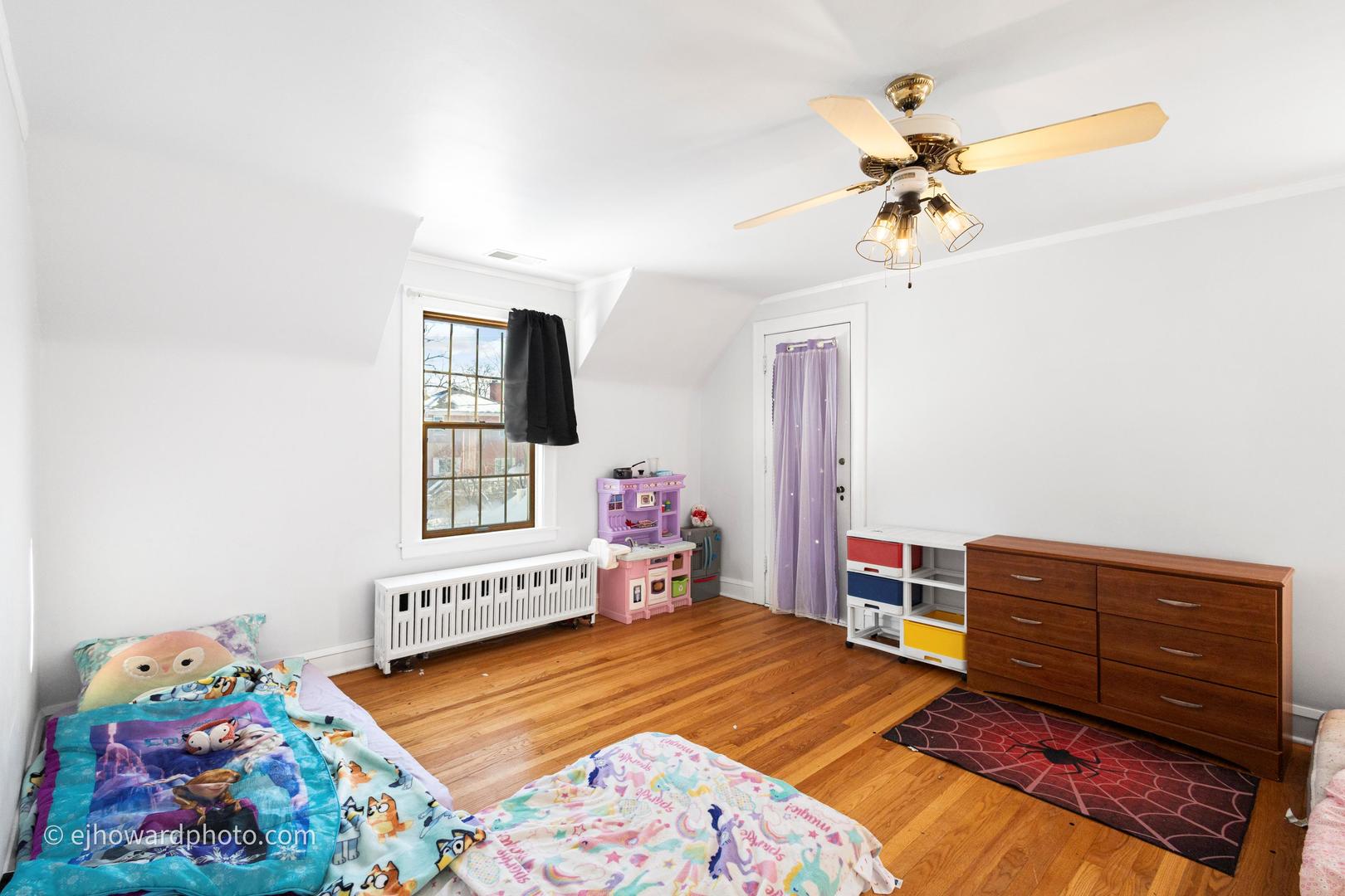 3655 Kent Place Crete, IL 60417 - Photo 15 of 29 a bedroom with a bed and a dresser