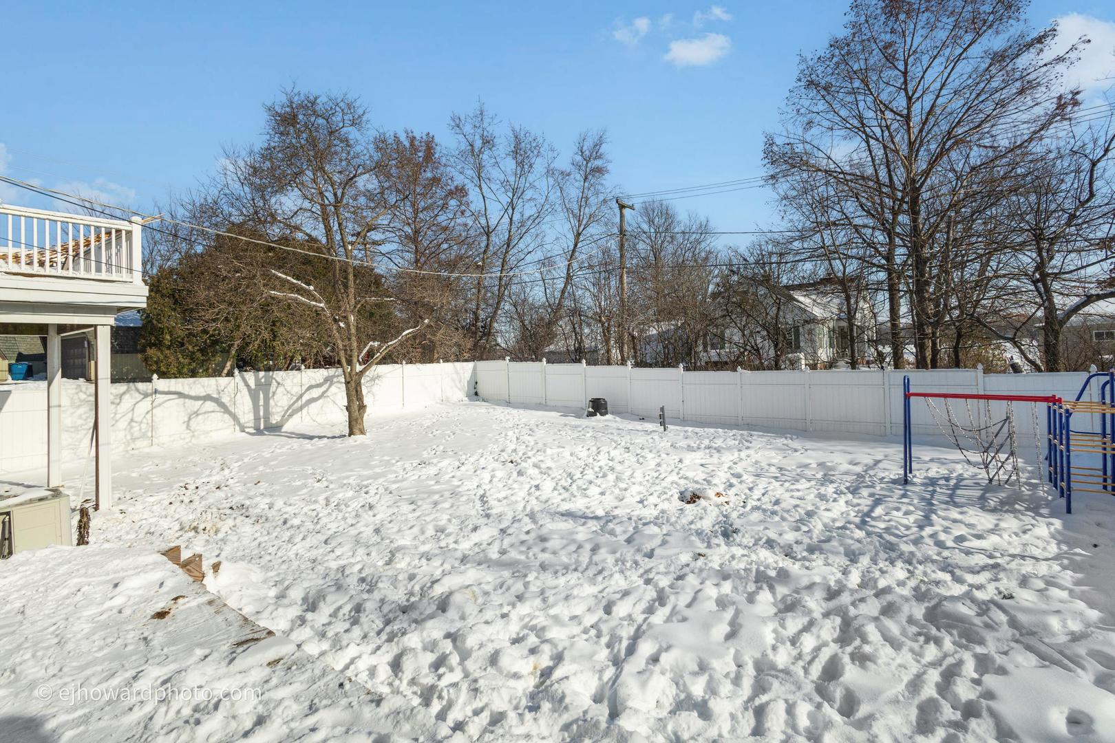3655 Kent Place Crete, IL 60417 - Photo 19 of 29 a view of a yard covered in snow