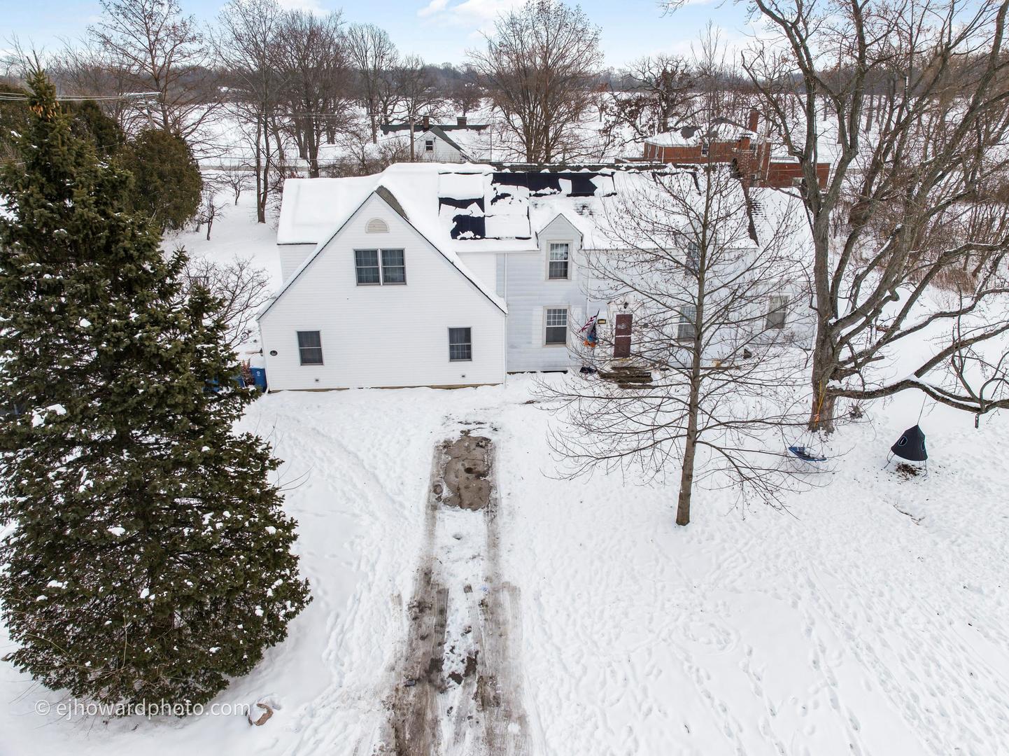 3655 Kent Place Crete, IL 60417 - Photo 21 of 29 a view of a white house with a yard