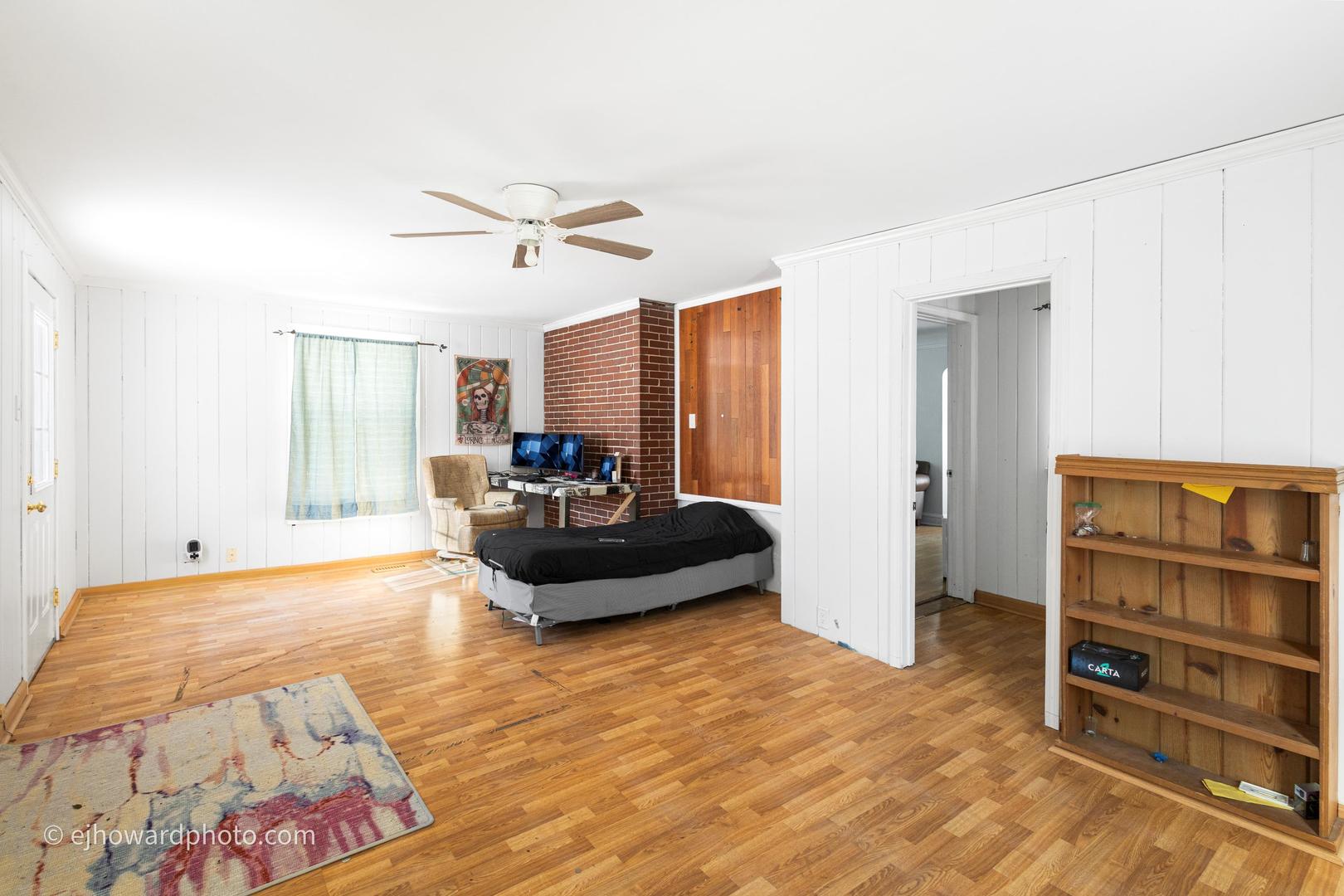 3655 Kent Place Crete, IL 60417 - Photo 6 of 29 a living room with furniture and a book shelf