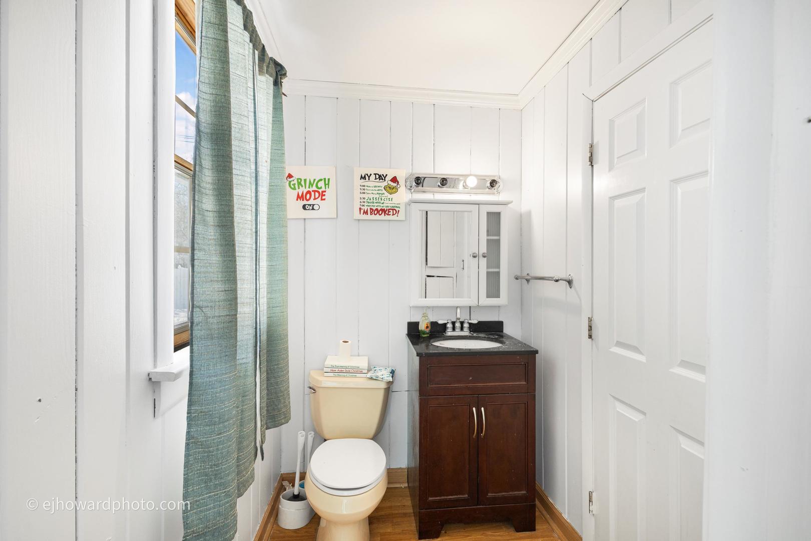 3655 Kent Place Crete, IL 60417 - Photo 7 of 29 a white toilet sitting next to a bathroom sink
