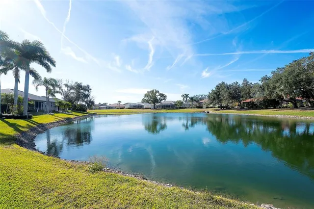 a view of a lake with a yard