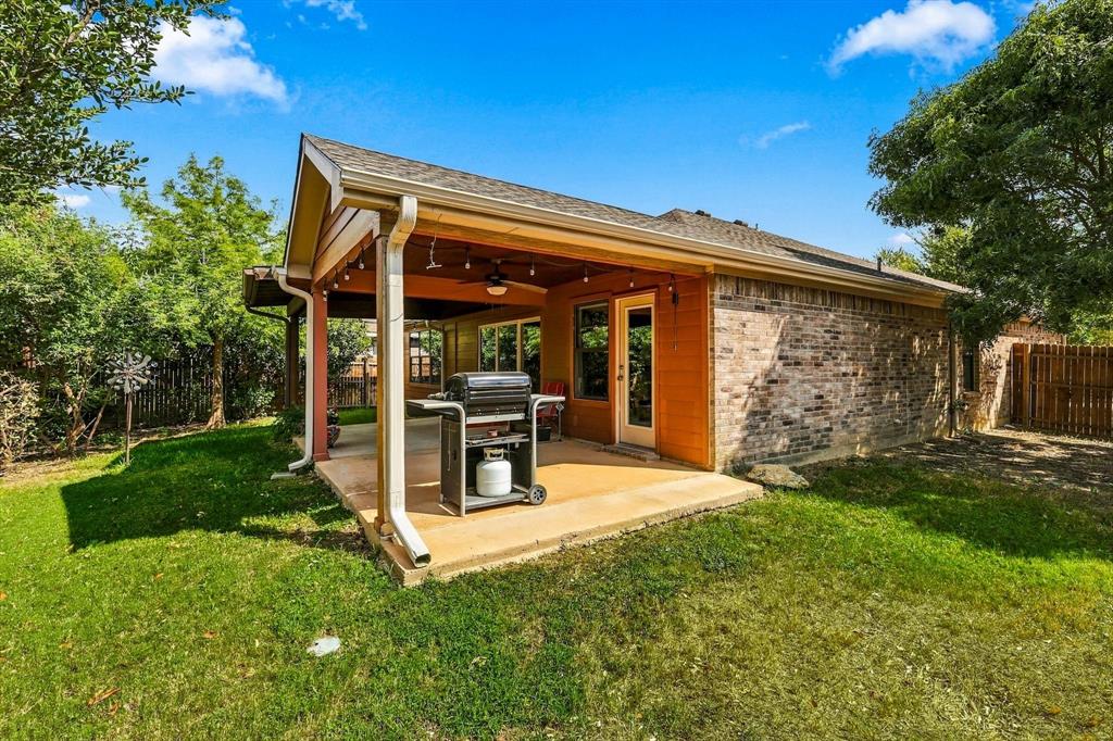 4301 Grassmere Road Fort Worth, TX 76244 - Photo 39 of 40 Enjoy the covered patio and shade.