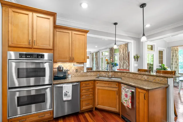 a bathroom with a sink a mirror and vanity