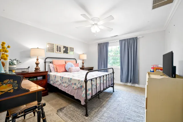 an aerial view of residential house with outdoor space and swimming pool