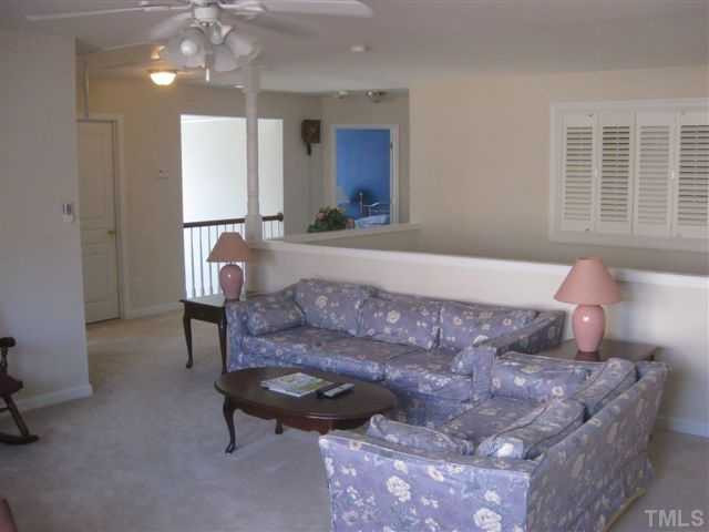 3905 Sunset Maple Court Raleigh, NC 27612 - Photo 13 of 19 Sitting area in loft.