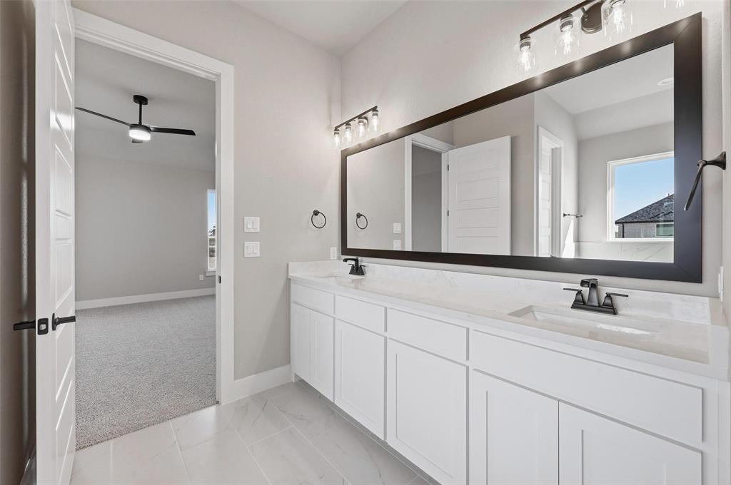 108 Rocky Top Azle, TX 76020 - Photo 18 of 40 a bathroom with a double vanity sink mirror and