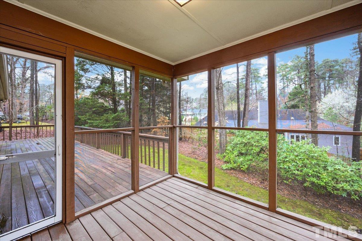 4112 Landfall Court Raleigh, NC 27613 - Photo 25 of 27 a view of a balcony with wooden floor