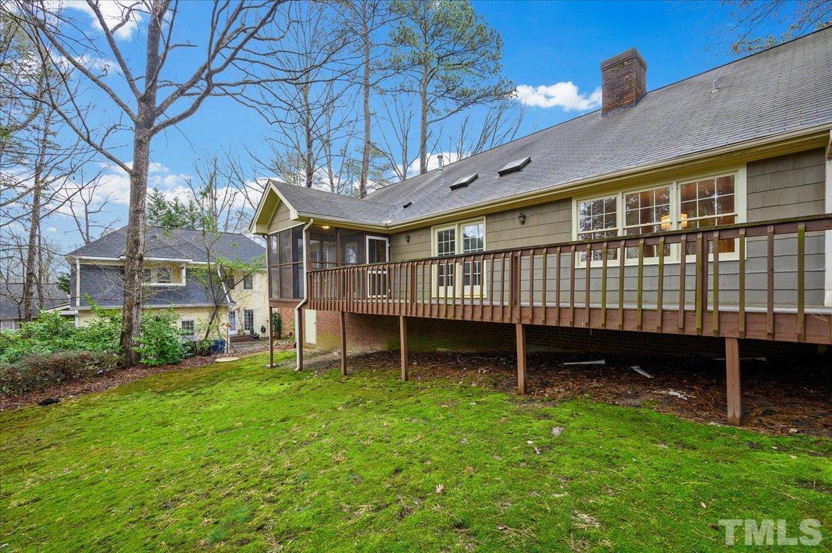 4112 Landfall Court Raleigh, NC 27613 - Photo 27 of 27 a view of a house with a backyard and stairs