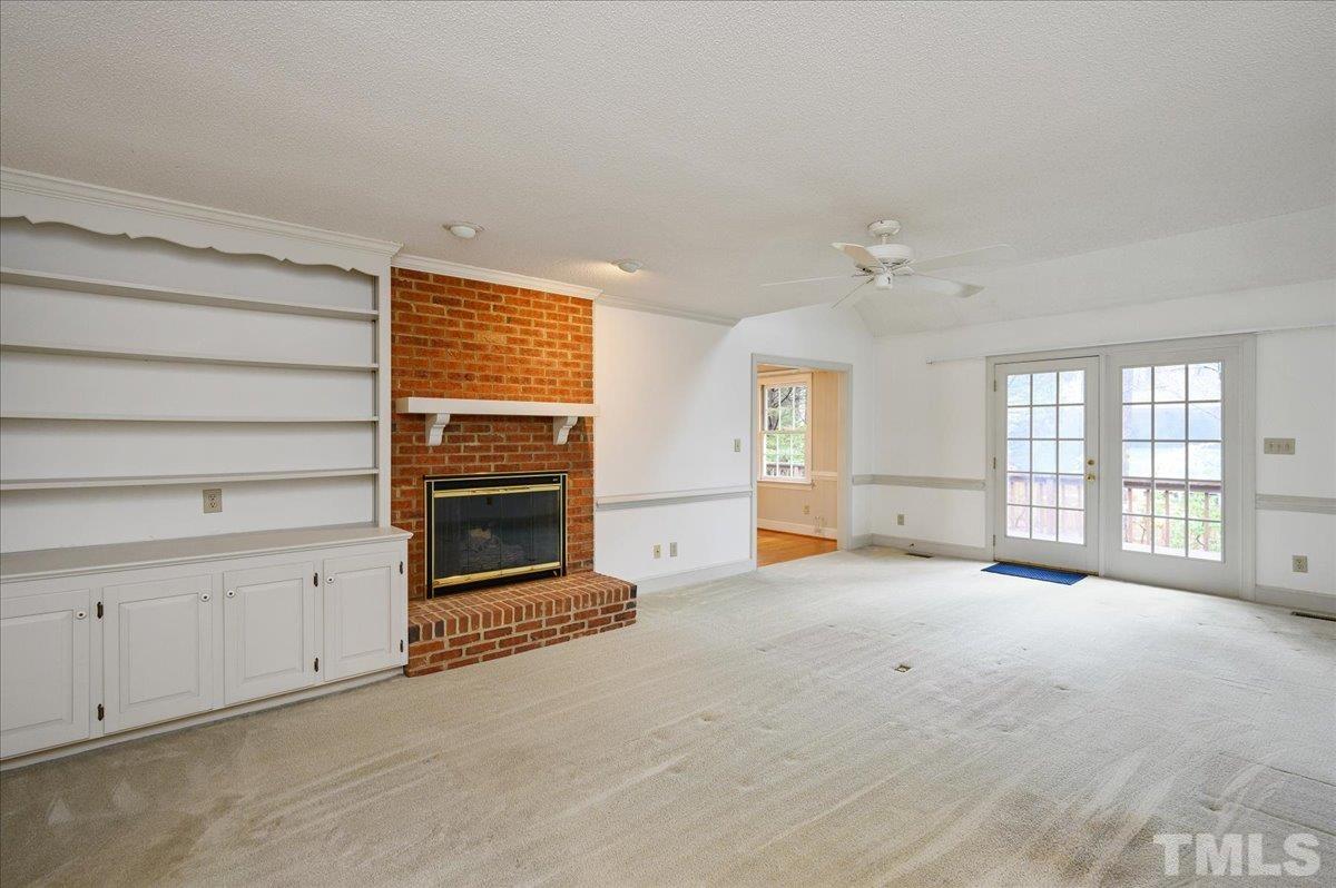 4112 Landfall Court Raleigh, NC 27613 - Photo 3 of 27 a view of an empty room with a window