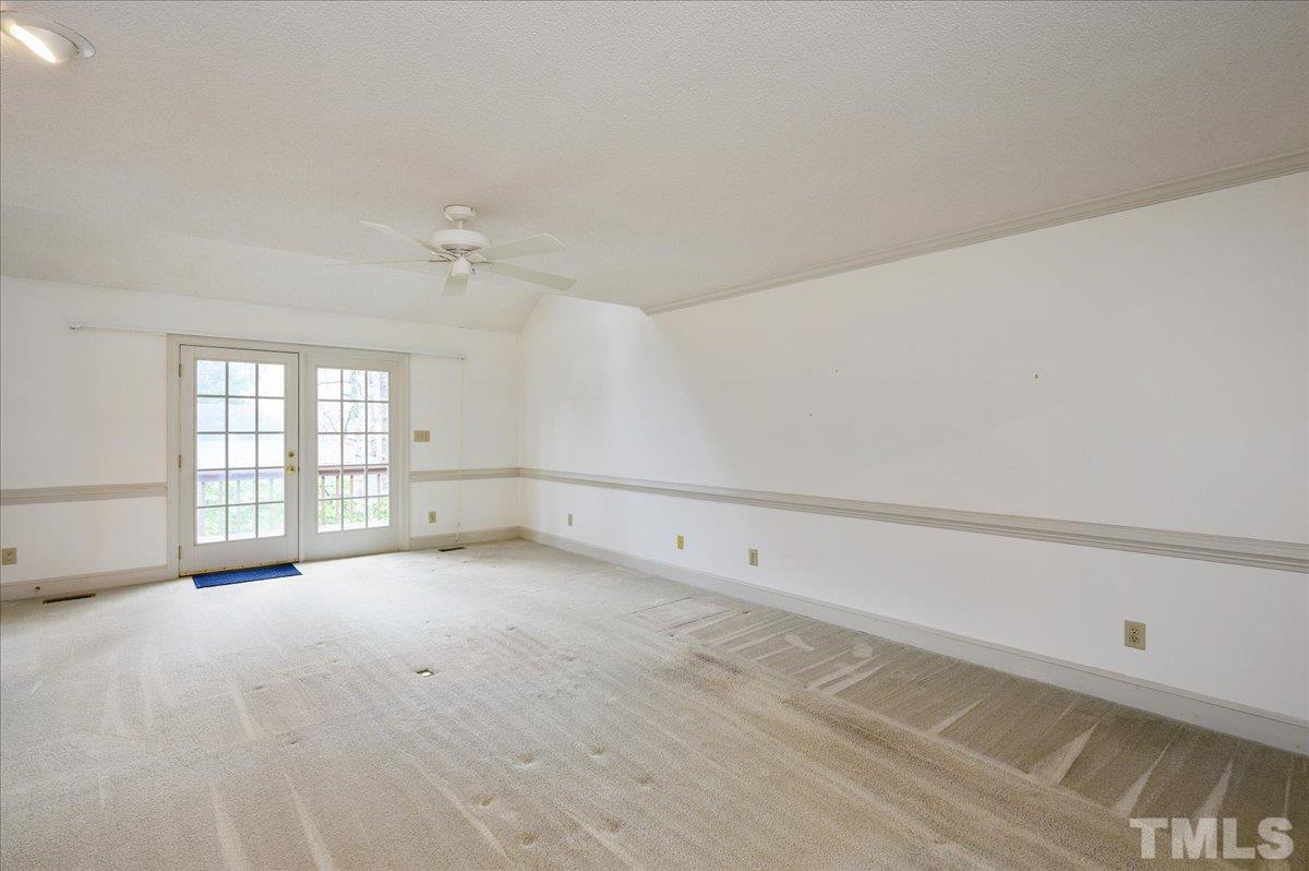 4112 Landfall Court Raleigh, NC 27613 - Photo 5 of 27 a view of an empty room with a window