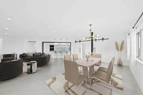 a view of a dining room with furniture