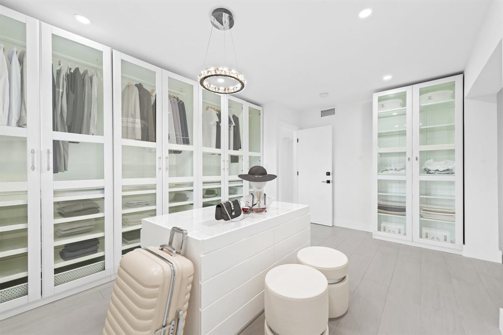 877 Northeast 195th Street, Unit 422 Miami, FL 33179 - Photo 9 of 23 a living room with furniture and a large window